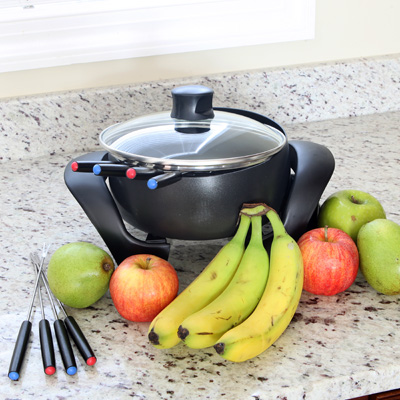 WEST BEND® 3 Quart Fondue Pot - Electric fondue pot is great for a variety of dishes.  Features variable heat settings from warm to 400 degrees, QuickRelease™ power cord, 8 fondue forks and premium non-stick interior.  Dishwasher safe. 
